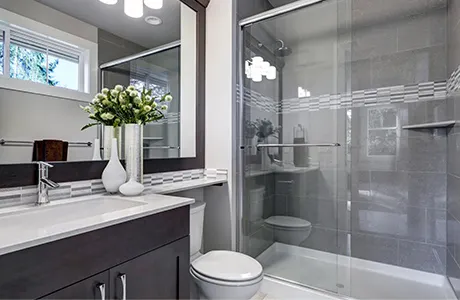 bathroom with semi-frameless shower.